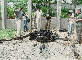 Remains of bomb-laden car shown to press